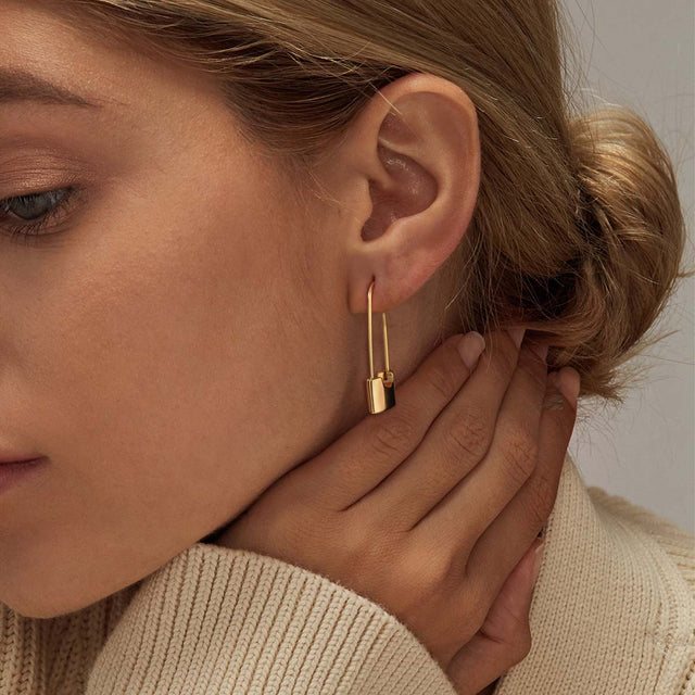 Fettero® lock dangle earrings styled on model, gold earrings for women perfect for everyday wear