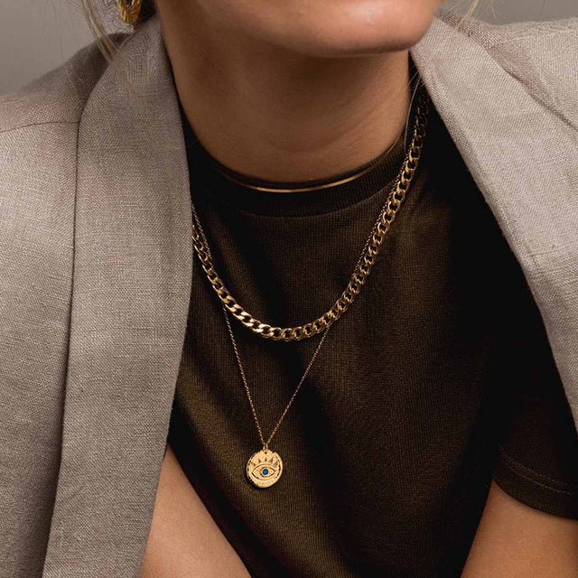 Fettero® blue turquoise eye pendant necklace styled on model, gold necklace for women perfect for everyday wear and gifting