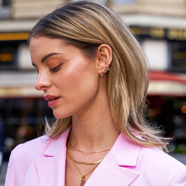 Model wearing Fettero® boho color tiny hoop earrings, gold hoops for women designed for everyday wear