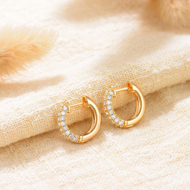 Close-up detail of Fettero® classic CZ hoop earrings featuring sparkling cubic zirconia and polished gold finish