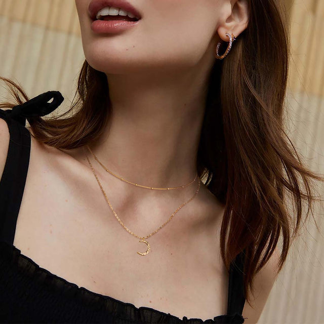 Fettero® crescent moon necklace styled on model, gold necklace for women perfect for everyday wear and gifting