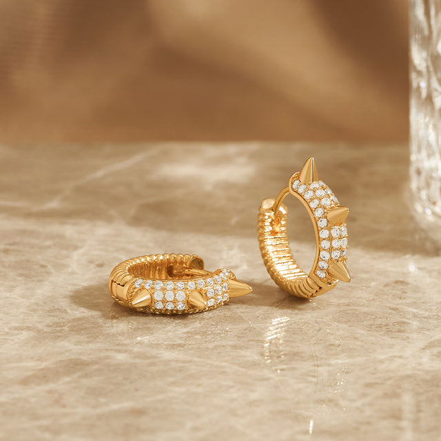 Close-up detail of Fettero® dainty spike hoop earrings, polished gold finish and fine craftsmanship for women