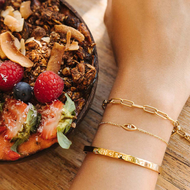 Fettero® evil eye CZ chain bracelet styled on model, gold bracelet for women perfect for everyday wear and gifting