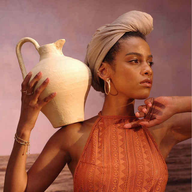 Fettero® large snake hoop earrings styled on model, gold earrings for women perfect for daily outfits and gifting