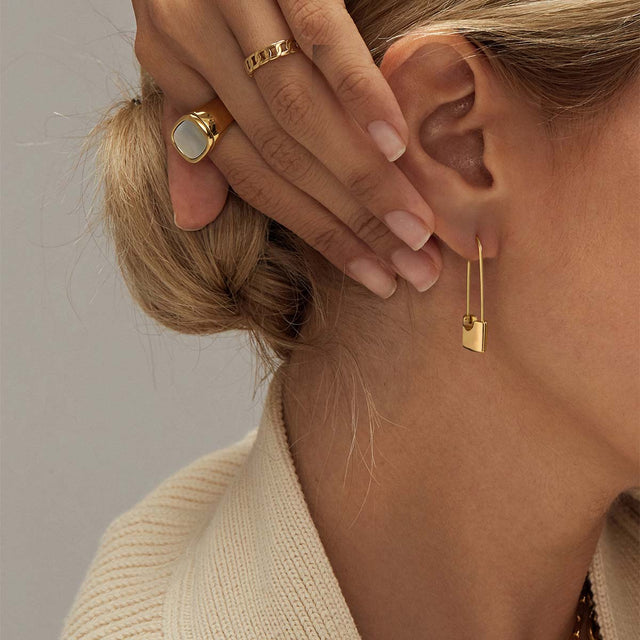 Fettero® lock dangle earrings styled on model, gold earrings for women perfect for everyday wear and gifting