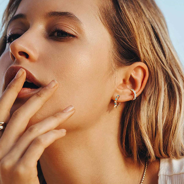 Fettero® turquoise spike hoop earrings styled on model, gold earrings for women perfect for daily outfits and gifting