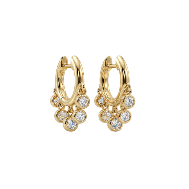 White CZ dangle huggie earrings in gold for women by Fettero®, elegant everyday wear jewelry and thoughtful gift