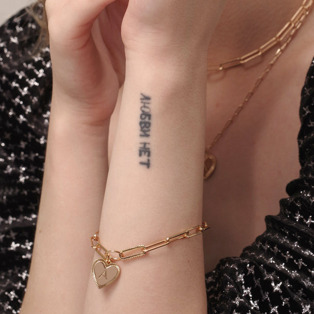 Fettero® initial heart bracelet styled on model, gold bracelet for women ideal for daily wear and gifting