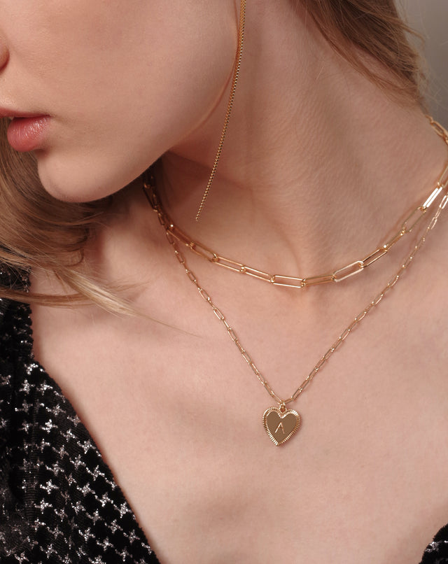 Fettero® initial layered necklace styled on model, gold necklace for women perfect for everyday wear and gifting