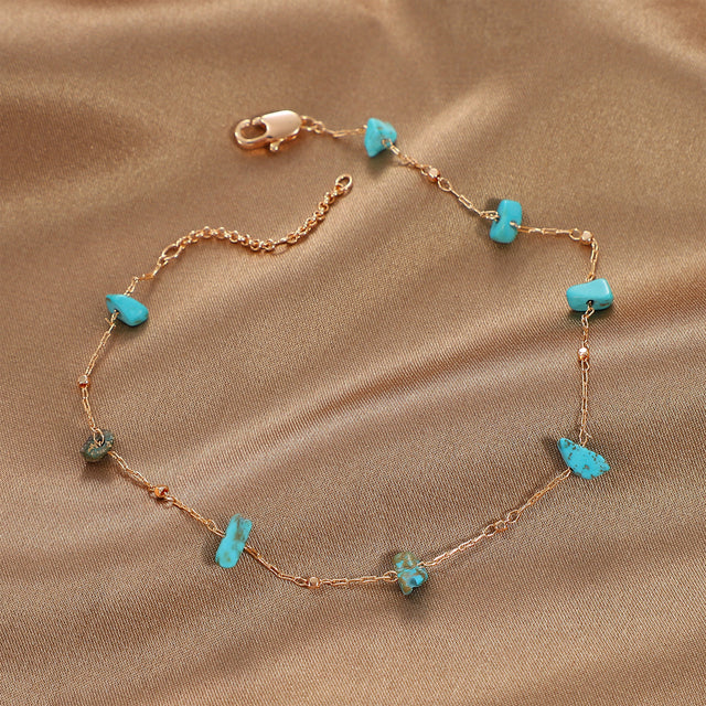 Fettero® natural turquoise chain anklet styled on model, gold anklet for women perfect for daily outfits