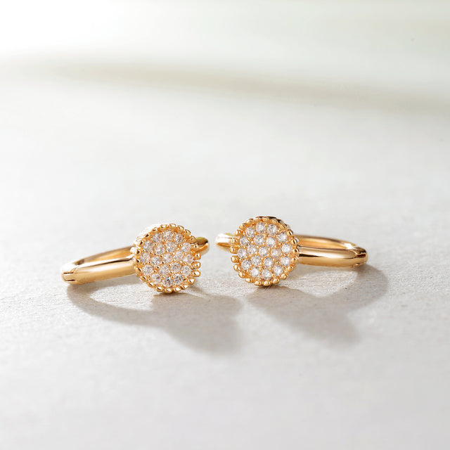 Close-up detail of Fettero® retro CZ hoop earrings, polished gold finish and sparkling cubic zirconia for women