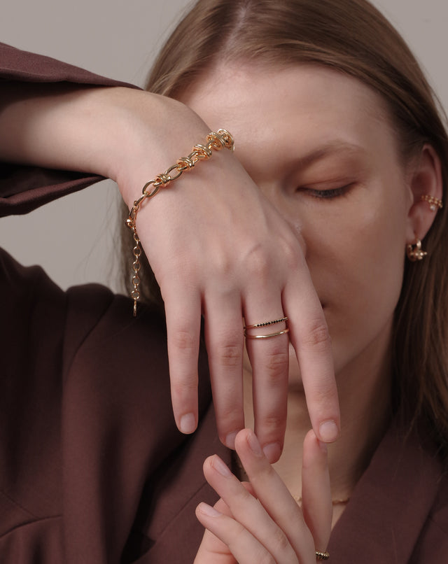 Fettero® satellite link bracelet styled on model, gold bracelet for women perfect for everyday wear and gifting